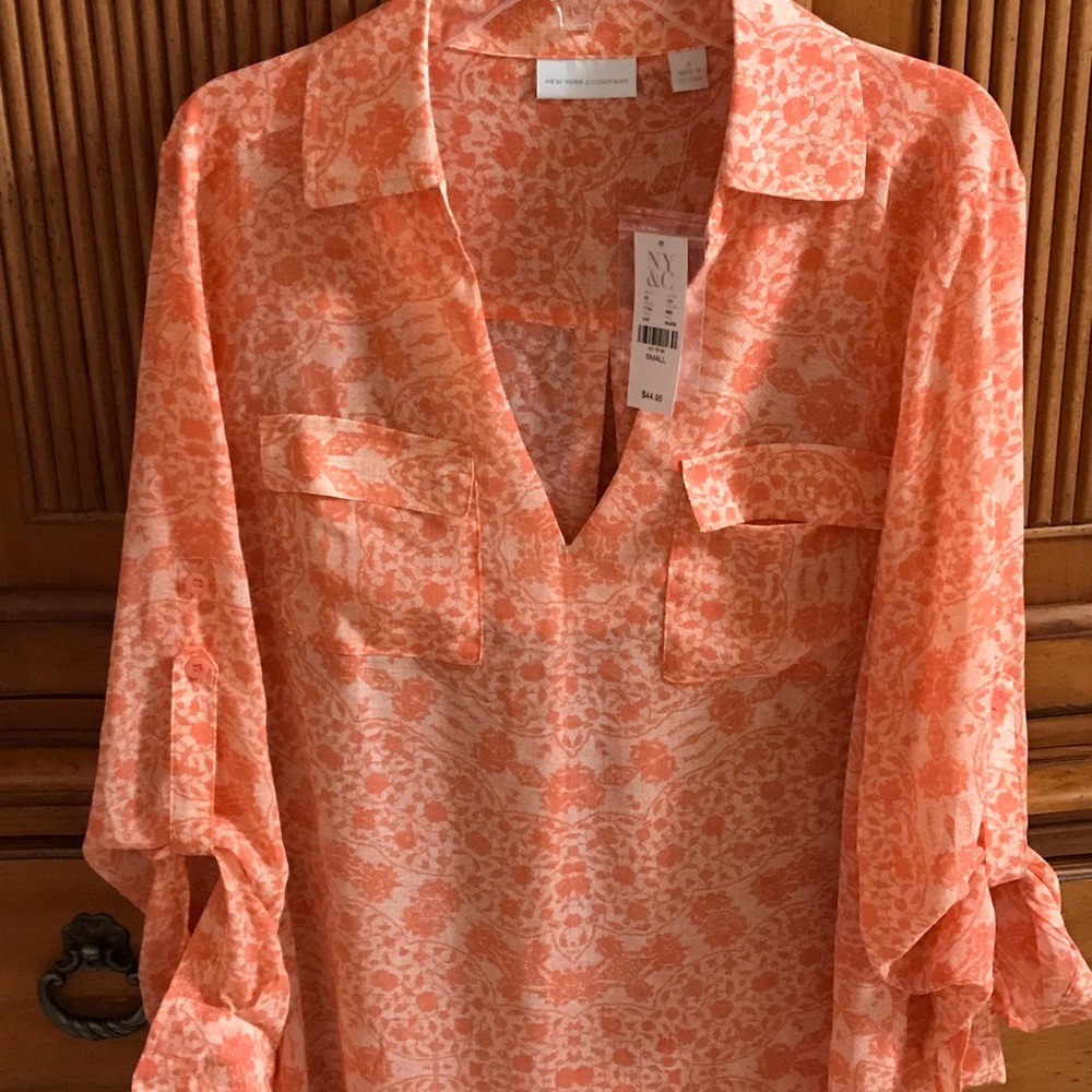 New York & Co orange flowered blouse. Brand new.